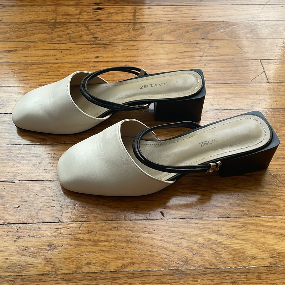 White and black slide on sandals